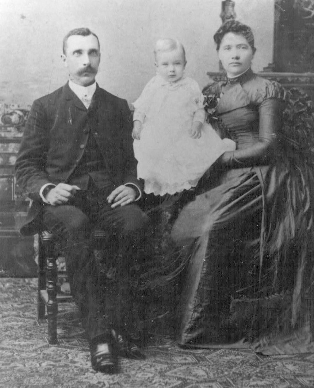 Lancelot Charles Sandes and Joanna O'Connor holding Charles Francis Sandes